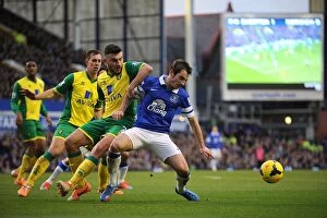 Everton 2 v Norwich City 0 : Goodison Park : 11-01-2014 Collection: Battle at Goodison Park: A Tactical Clash - Leighton Baines vs. Robert Snodgrass