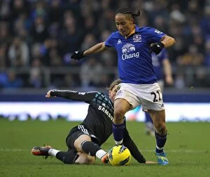 11 February 2012, Everton v Chelsea Collection: Battle at Goodison Park: Torres vs. Pienaar - A Premier League Clash Between Everton and Chelsea