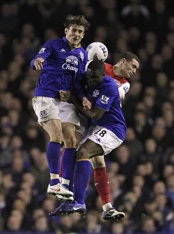 Images Dated 21st March 2012: Battle at Goodison Park: Vermaelen vs. Anichebe and Jelavic - Everton vs