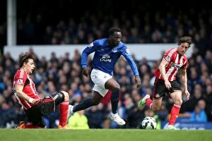 Images Dated 9th May 2015: A Battle for Possession: Lukaku vs. Coates at Goodison Park - Everton vs. Sunderland, May 2015