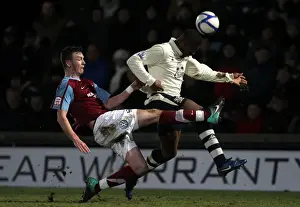 Battling for the Ball: Anichebe vs. Raynes - FA Cup Third Round Clash between Scunthorpe United and Everton (January 2011)