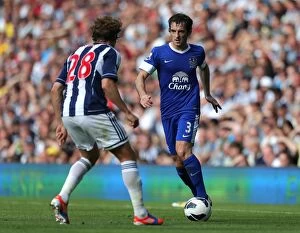 Images Dated 1st September 2012: Battling for the Ball: Olsson vs. Baines - Everton vs. West Bromwich Albion