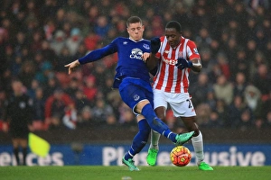 Stoke City V Everton - Britannia Stadium Prints: Battling for Control: Ross Barkley vs
