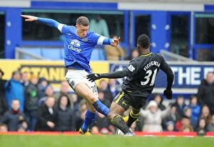 Images Dated 9th March 2013: Battling for FA Cup Supremacy: Ross Barkley vs. Maynor Figueroa (Everton vs)