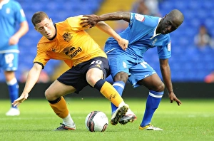 30 July 2011 Birmingham City V Everton Prints: Battling on the Pitch: Morgaro Gomis vs