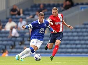 Images Dated 27th July 2013: Battling for Supremacy: Ross Barkley vs. Alex Marrow in Everton's Pre-Season Victory over