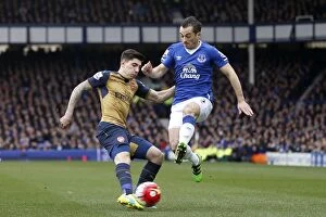 Images Dated 19th March 2016: Bellerin vs Baines: A Football Battle for Ball Possession - Everton vs Arsenal
