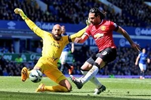 Images Dated 26th April 2015: Blocked by Howard: Falcao's Thwarted Shot - Everton vs Manchester United