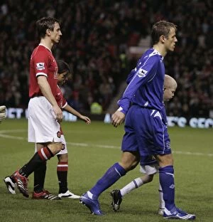 Images Dated 29th November 2006: Brothers Neville and Neville lead out Manchester United and Everton