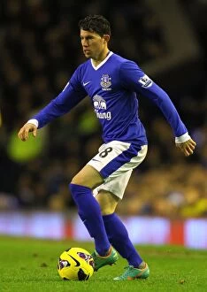 Images Dated 26th December 2012: Bryan Oviedo Scores the Winning Goal: Everton Triumphs over Wigan Athletic (2-1) at Goodison Park