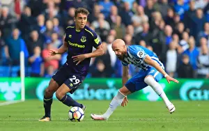 Premier League Prints: Calvert-Lewin vs Bruno: Intense Battle for Ball in Premier League Match between Brighton and Everton