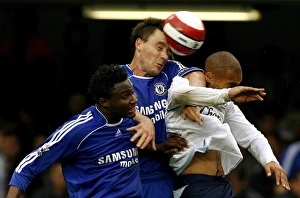 Chelsea v Everton Collection: Chelseas Terry challenges Evertons Vaughan during their English Premier League soccer match