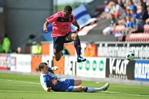 Clash at DW Stadium: Anichebe vs. Caldwell - Everton vs. Wigan Athletic, Premier League Showdown (30 April 2011)