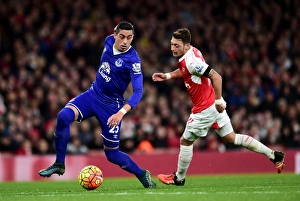 Framed Print : Clash at the Emirates: Funes Mori vs. Ozil - Arsenal vs. Everton, Premier League Showdown Framed Print : Clash at the Emirates: Funes Mori vs. Ozil - Arsenal vs. Everton, Premier League Showdown