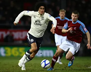 Framed Print : Clash of Giants: Fellaini vs. O'Connor - Everton's Showdown at Scunthorpe United's Glanford Park, FA Cup Third Round Framed Print : Clash of Giants: Fellaini vs. O'Connor - Everton's Showdown at Scunthorpe United's Glanford Park, FA Cup Third Round