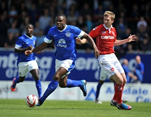 Pre Season Friendly - Morecambe V Everton - Globe Arena Prints: Clash at Globe Arena: Everton's Victor Anichebe vs Morecambe's Andy Wright