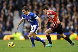 Everton 2 V Sunderland 1 : Goodison Park : 10-11-2012 Prints: Clash at Goodison Park: A Battle Between Leighton Baines and Adam Johnson