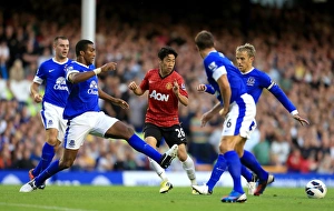 Everton 1 V Manchester United 0 : Goodison Park: 20-08-2012 Prints: Clash at Goodison Park: Everton vs Manchester United - Kagawa vs Distin & Neville