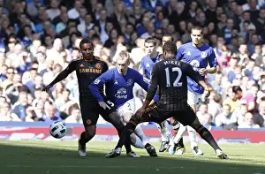 Clash at Goodison Park: Hibbert Stands Ground Against Malouda and Mikel