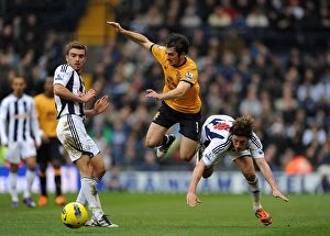 Images Dated 1st January 2012: Clash at The Hawthorns: Leighton Baines vs. Billy Jones (BPL, 01-01-2012)