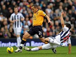 01 January 2012, West Bromwich Albion V Everton Prints: Clash at The Hawthorns: Paul Scharner Tackles Leon Osman (Everton vs)