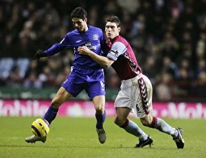 Images Dated 26th December 2005: Clash of the Midfield Maestros: Arteta vs Barry