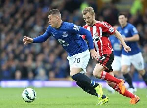 Images Dated 9th May 2015: Clash of Midfield Maestros: Barkley vs. Larsson at Goodison Park - Everton vs