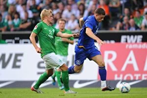 Images Dated 2nd August 2011: Clash of Talents: Florian Kohlfeldt (Werder Bremen) vs. Ross Barkley (Everton) - August 2011