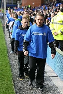 Images Dated 30th October 2010: Community Unity at Goodison Park: Everton Volunteers and Staff Join Forces with Stoke City During