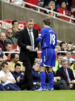 Images Dated 4th May 2008: David Moyes Consults with Phil Neville during Arsenal vs. Everton (2008) Premier League Match