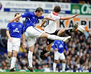 Images Dated 11th March 2006: David Weir vs. Brian McBride: A Football Rivalry - Everton vs. Fulham