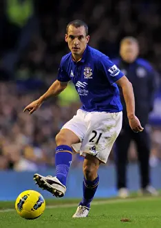 Framed Print : Decisive Moment: Leon Osman Scores Game-Winning Goal for Everton Against Norwich City (17 December 2011)