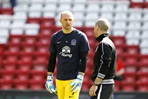 Liverpool 0 V Everton 0 : Anfield : 05-05-2013 Prints: Deep in Thought: Tim Howard Engages Everton Teammate Amidst Scoreless Liverpool Rivalry (Barclays Premier League)