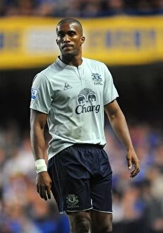 Images Dated 15th October 2011: Defiant Distin Stands Firm Against Chelsea: Everton's Unyielding Rivalry (15 October 2011)