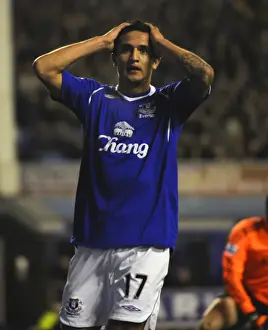 Dejected Tim Cahill: Everton's Agony Against Chelsea in the 08/09 Barclays Premier League