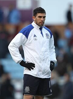 Images Dated 14th January 2012: Denis Stracqualursi Scores the Game-Winning Goal for Everton Against Aston Villa in the Barclays