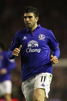 Images Dated 13th March 2012: Denis Stracqualursi's Determined Display: Everton at Anfield vs Liverpool (BPL, 13 March 2012)