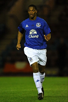 Kieran Agard Prints: Determined Striker in Everton Colors: Kieran Agard
