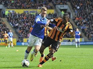 Images Dated 11th May 2014: Deulofeu vs Figueroa: Everton's Triumph over Hull City in the Barclays Premier League (11-05-2014)