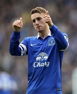 Everton 2 v Cardiff City 1 : Goodison Park : 15-03-2014 Collection: Deulofeu's Dramatic Gesture: Everton's Triumph over Cardiff City in the Barclays Premier League