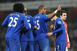 Images Dated 2nd February 2011: Distin at the Heart: Everton vs Arsenal, Premier League Clash (01 February 2011)