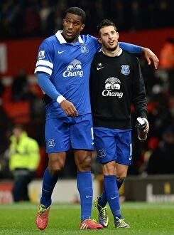 Images Dated 4th December 2013: Distin and Mirallas: Everton's Triumphant Victory Celebration at Old Trafford