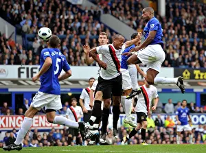 Framed Print : Distin Strikes First: Everton's Winning Goal vs Manchester City (07 May 2011, Goodison Park) Framed Print : Distin Strikes First: Everton's Winning Goal vs Manchester City (07 May 2011, Goodison Park)