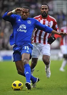 01 January 2011 Stoke City V Everton Prints: Distin vs. Fuller: A Football Battle at Britannia Stadium - Everton vs