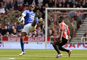 Sunderland 1 V Everton 0 : Stadium Of Light : 20-04-2013 Prints: Distin vs Sessegnon: A Premier League Showdown at Stadium of Light (Everton 0-1 Sunderland)