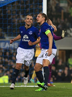 Framed Print : Double the Joy: Jagielka and Osman's Europa League Goal Celebration for Everton Framed Print : Double the Joy: Jagielka and Osman's Europa League Goal Celebration for Everton