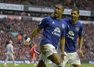 Images Dated 16th January 2011: The Dramatic Comeback: Distin and Beckford's Equalizer at Anfield (16 January 2011)
