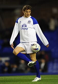 Images Dated 21st March 2012: Dramatic Last-Minute Triumph: Jelavic's Stunner Silences Arsenal (BPL 2012, Everton 1-0)