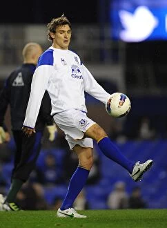 Images Dated 21st March 2012: Dramatic Last-Minute Victory: Nikica Jelavic Scores for Everton Against Arsenal in BPL 2012