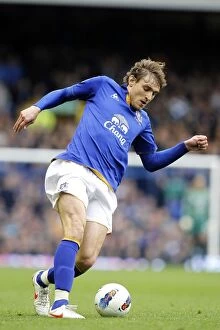 Images Dated 31st March 2012: Dramatic Winner: Nikica Jelavic Scores Last-Minute Goal to Give Everton Victory Over West Bromwich